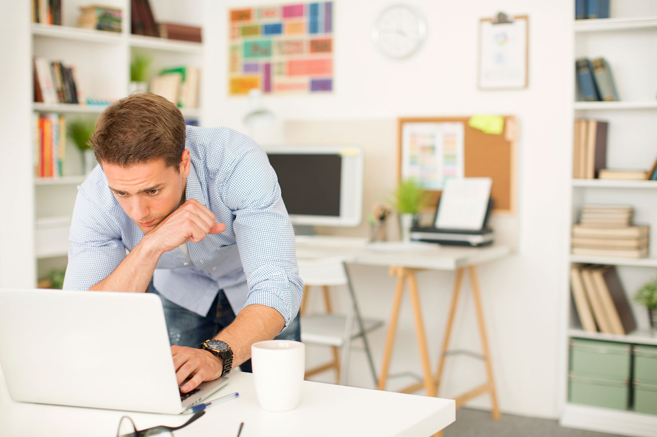 man on computer